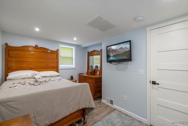 9184 Newcomb Rd, Evans, NY 14006 - bedroom featuring light wood-style floors and recessed lighting