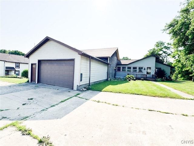 1155 County Route 53, Scriba, NY 13126 - view of front of house with an attached garage, concrete driveway, and a front yard