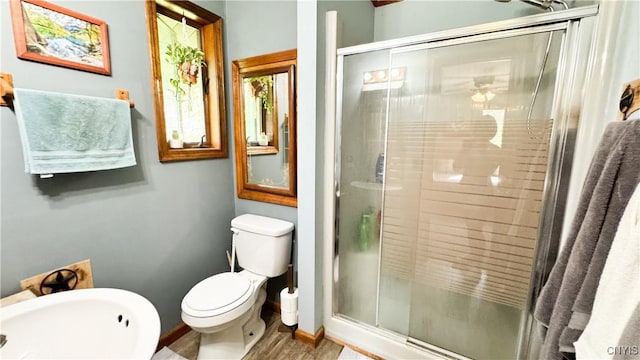 1155 County Route 53, Scriba, NY 13126 - bathroom with a stall shower and wood finished floors