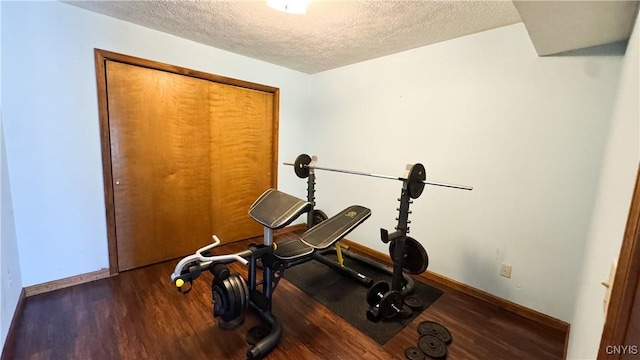1155 County Route 53, Scriba, NY 13126 - exercise room featuring a textured ceiling and wood finished floors