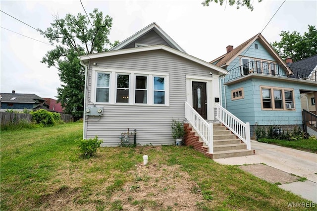 14 Phyllis Ave, Buffalo, NY 14215 - view of front of home with a front lawn and a balcony