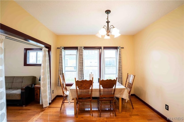 14 Phyllis Ave, Buffalo, NY 14215 - dining space featuring a chandelier and light wood-style floors