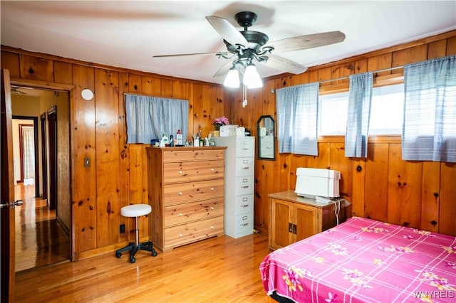 14 Phyllis Ave, Buffalo, NY 14215 - bedroom featuring wooden walls and light wood-type flooring