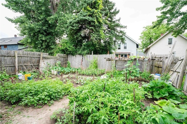 14 Phyllis Ave, Buffalo, NY 14215 - fenced backyard featuring a garden