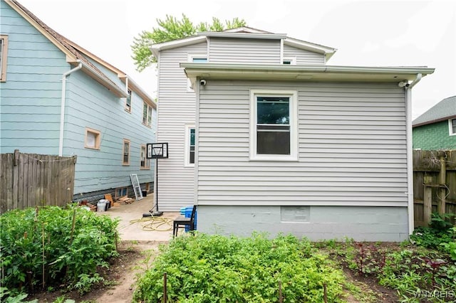 14 Phyllis Ave, Buffalo, NY 14215 - rear view of house with a patio