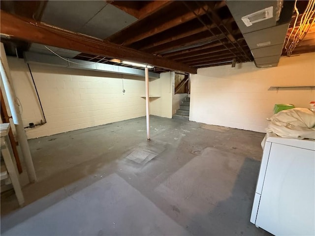 5 Breen St, Mount Morris, NY 14510 - unfinished basement featuring washer / dryer and stairway