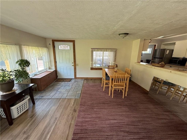 5 Breen St, Mount Morris, NY 14510 - dining room featuring a textured ceiling and wood finished floors