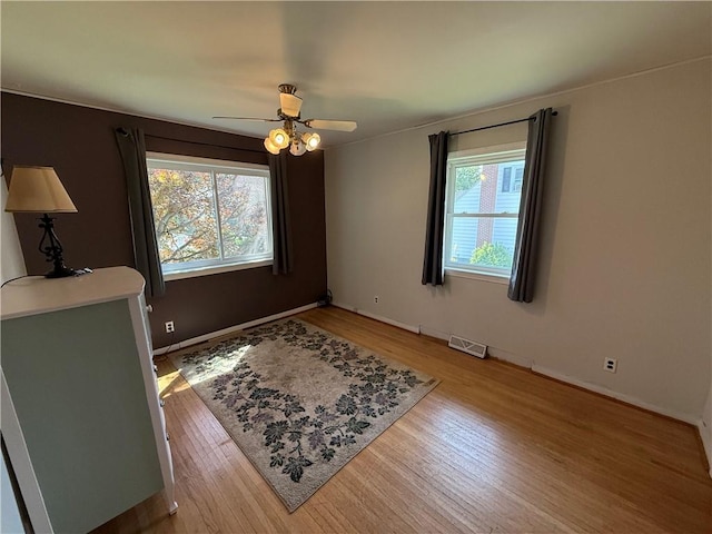 5 Breen St, Mount Morris, NY 14510 - bedroom with light wood-type flooring and ceiling fan