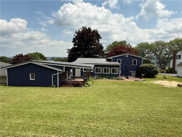 5 Breen St, Mount Morris, NY 14510 - back of house featuring a yard
