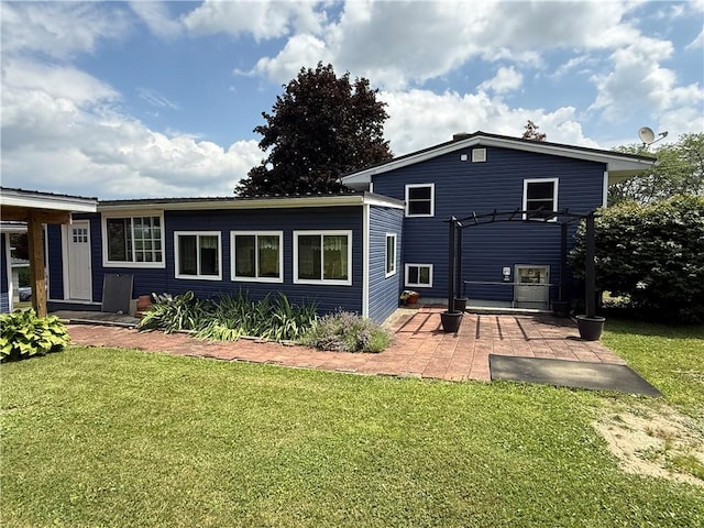 5 Breen St, Mount Morris, NY 14510 - back of house featuring a lawn, a patio, and a pergola