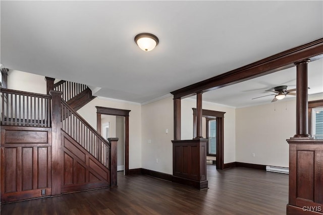 315 Otsego St, German Flatts, NY 13357 - entrance foyer featuring a baseboard radiator, dark wood-type flooring, stairway, ceiling fan, and crown molding