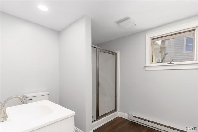 315 Otsego St, German Flatts, NY 13357 - bathroom with baseboard heating, a shower stall, wood finished floors, and recessed lighting
