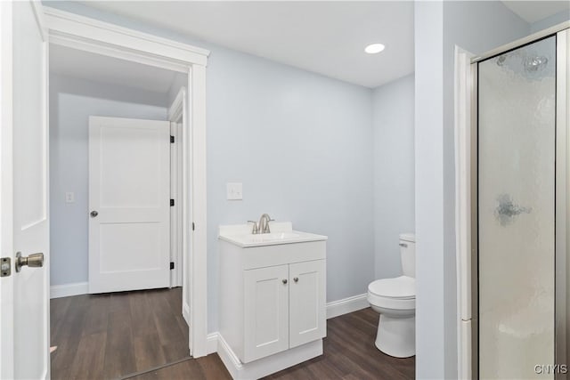 315 Otsego St, German Flatts, NY 13357 - full bathroom with wood finished floors, a stall shower, vanity, and recessed lighting