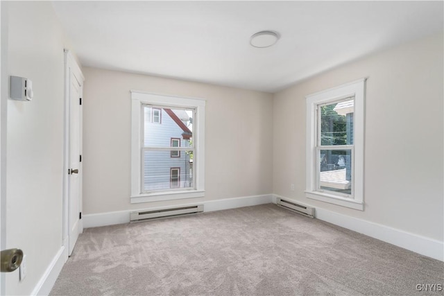 315 Otsego St, German Flatts, NY 13357 - spare room with baseboard heating and carpet