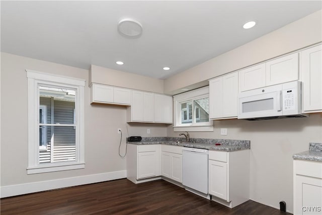 315 Otsego St, German Flatts, NY 13357 - kitchen featuring white appliances, dark wood-style flooring, white cabinets, and recessed lighting