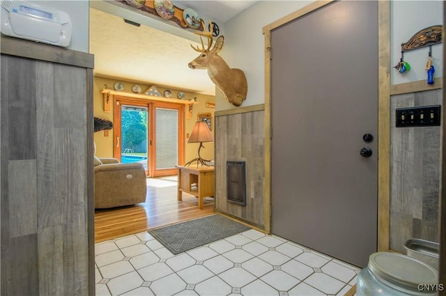 4043 Libra Ln, Clay, NY 13090 - bathroom with tile patterned floors and a fireplace