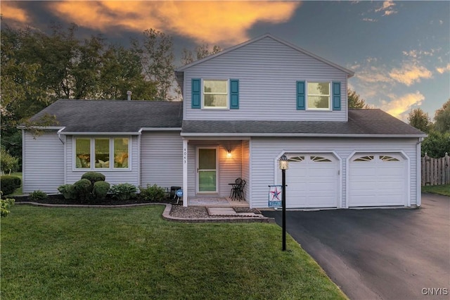 4043 Libra Ln, Clay, NY 13090 - traditional-style home featuring driveway, roof with shingles, and an attached garage
