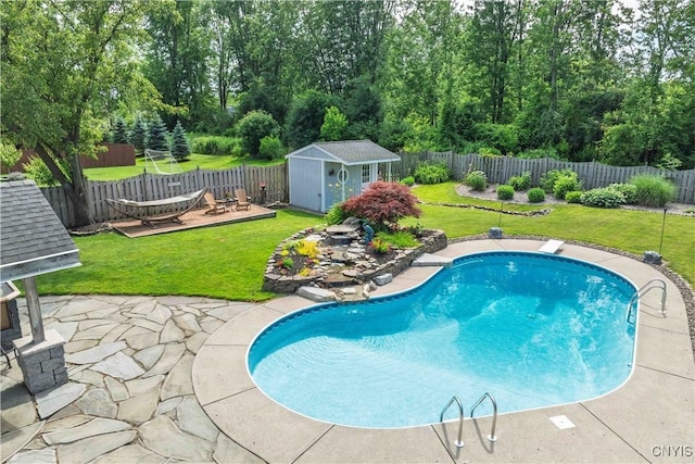 4043 Libra Ln, Clay, NY 13090 - view of pool with a fenced backyard, a patio, a storage shed, and a diving board
