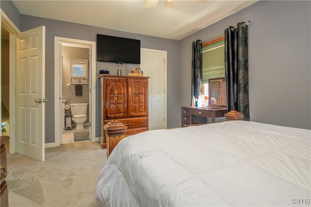 4043 Libra Ln, Clay, NY 13090 - bedroom featuring light carpet, ensuite bath, and a ceiling fan