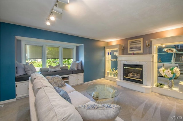 4043 Libra Ln, Clay, NY 13090 - carpeted living room with a high end fireplace and baseboards