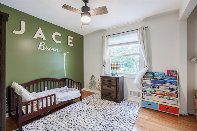 131 Cindy Ln, Greece, NY 14626 - bedroom featuring wood finished floors and ceiling fan