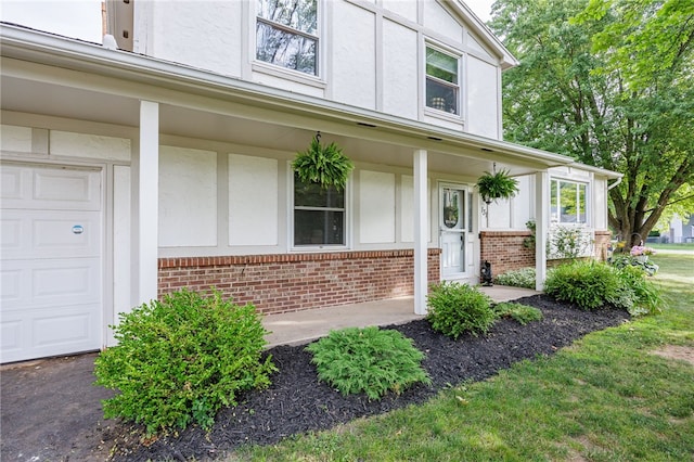131 Cindy Ln, Greece, NY 14626 - entrance to property featuring brick siding and stucco siding