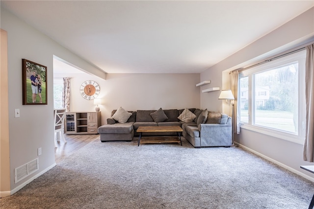 131 Cindy Ln, Greece, NY 14626 - living area featuring carpet and baseboards