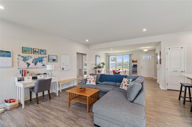 254 Longleaf Ln, Walworth, NY 14502 - living area with light wood-type flooring and recessed lighting