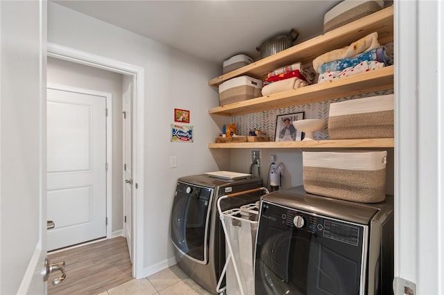 254 Longleaf Ln, Walworth, NY 14502 - washroom with washing machine and dryer and light tile patterned floors