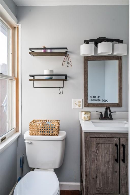 67 Pleasant St, Phelps, NY 14532 - bathroom with toilet and vanity