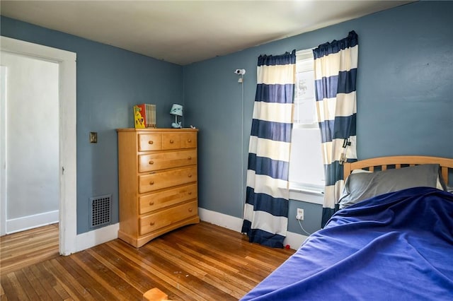 67 Pleasant St, Phelps, NY 14532 - bedroom featuring hardwood / wood-style floors and baseboards