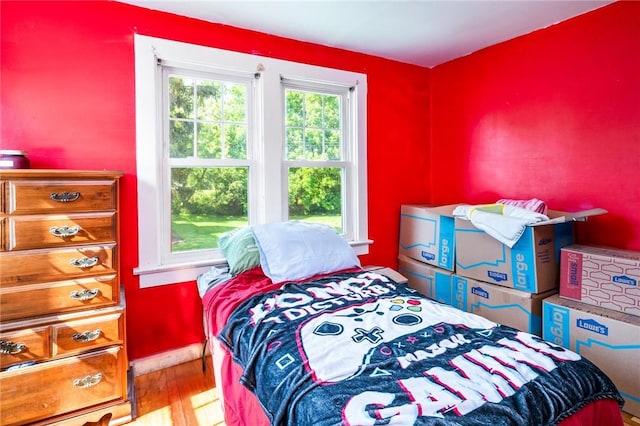 67 Pleasant St, Phelps, NY 14532 - bedroom with wood finished floors