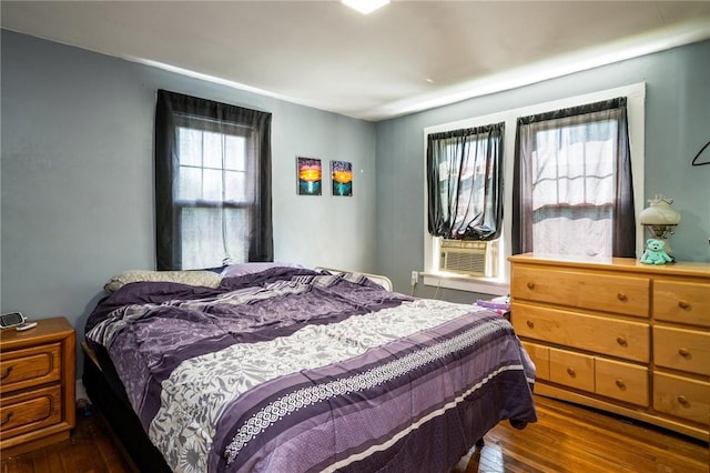 67 Pleasant St, Phelps, NY 14532 - bedroom featuring hardwood / wood-style floors and cooling unit