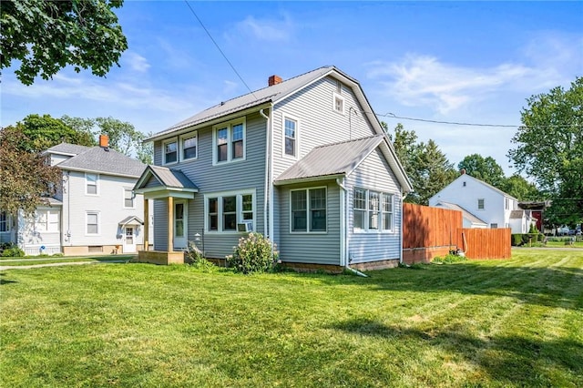 67 Pleasant St, Phelps, NY 14532 - rear view of house with a chimney