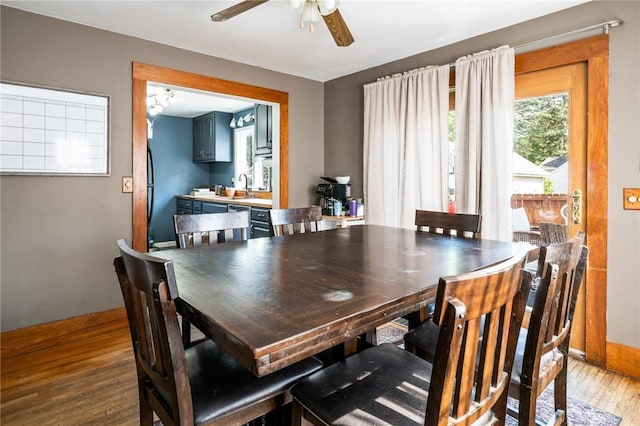 67 Pleasant St, Phelps, NY 14532 - dining room featuring wood finished floors and ceiling fan