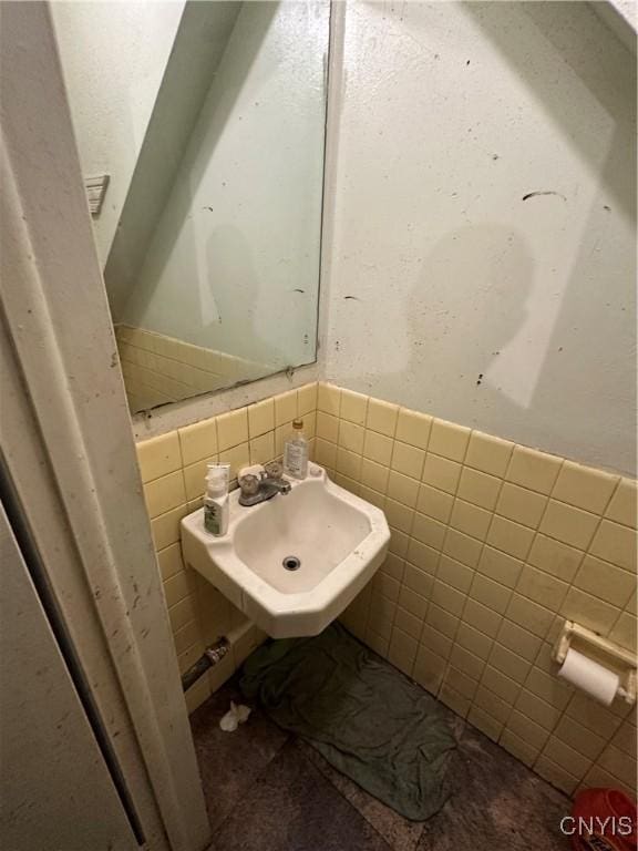 1417 Butternut St, Syracuse, NY 13208 - half bathroom featuring tile walls and wainscoting