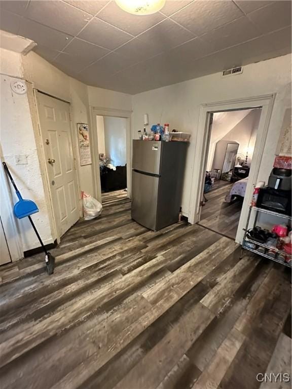 1417 Butternut St, Syracuse, NY 13208 - kitchen featuring freestanding refrigerator and dark wood-style floors