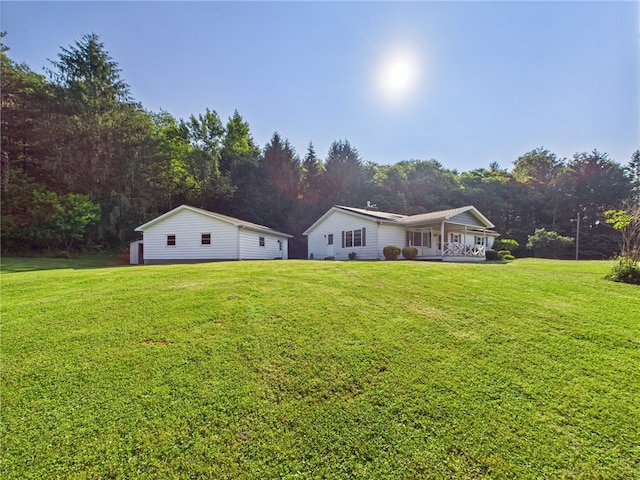 1041 Rte 44, Shinglehouse, PA 16748 - rear view of property featuring a yard and covered porch