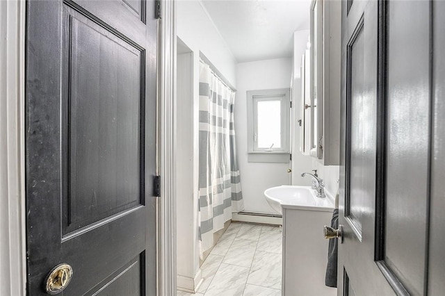 397 Merrill Pl, Southport, NY 14904 - full bath with marble look tiles, vanity, a baseboard radiator, and shower / bath combo with shower curtain