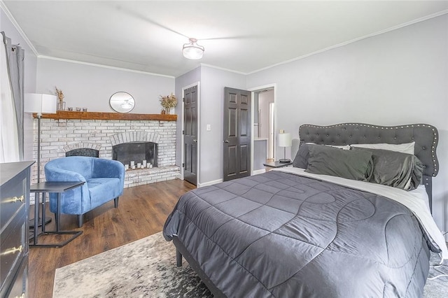 397 Merrill Pl, Southport, NY 14904 - bedroom with wood finished floors, ornamental molding, and a brick fireplace
