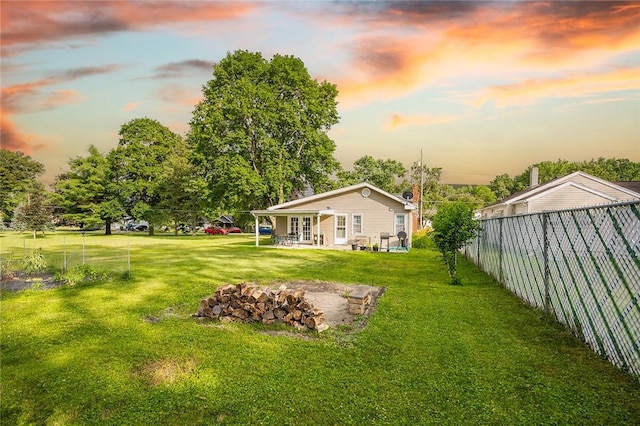 397 Merrill Pl, Southport, NY 14904 - yard at dusk with a patio and french doors