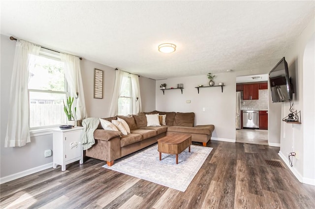 1948 Five Mile Line Rd, Penfield, NY 14526 - living room featuring dark wood-type flooring and a textured ceiling