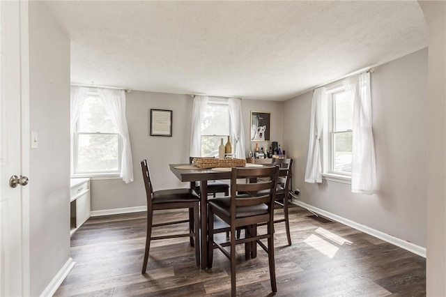 1948 Five Mile Line Rd, Penfield, NY 14526 - dining area with dark wood-type flooring and healthy amount of natural light