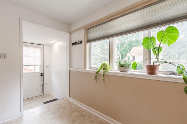 1948 Five Mile Line Rd, Penfield, NY 14526 - entryway featuring baseboards