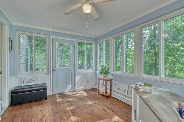 160 Cranbrook Ter, Webster, NY 14580 - sunroom / solarium with hardwood / wood-style floors, crown molding, and a deck