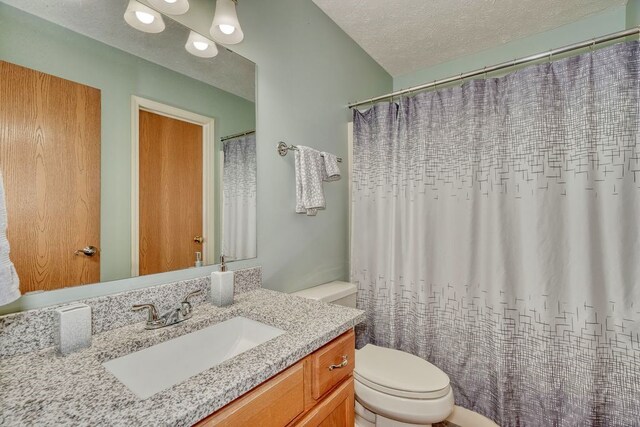 160 Cranbrook Ter, Webster, NY 14580 - bathroom with vanity, a textured ceiling, and curtained shower