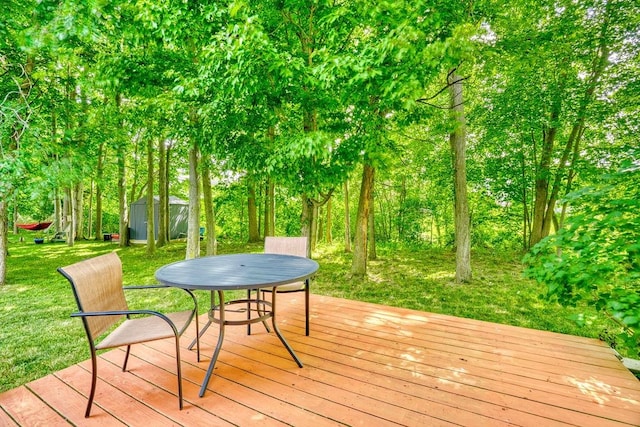 160 Cranbrook Ter, Webster, NY 14580 - wooden deck with a storage unit and a lawn