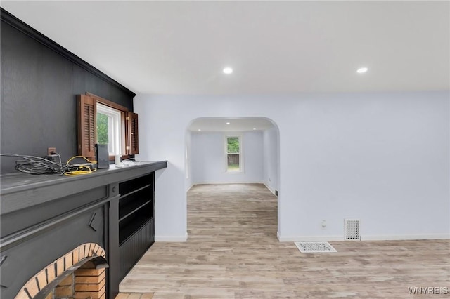 23 Lombardy St, Lancaster, NY 14086 - kitchen featuring arched walkways, light wood-style flooring, and recessed lighting