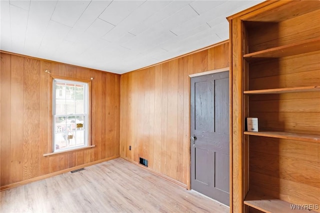 23 Lombardy St, Lancaster, NY 14086 - empty room featuring wood finished floors and wooden walls