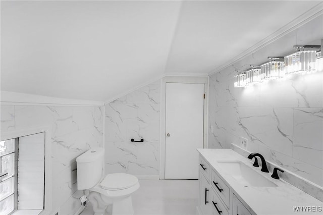 23 Lombardy St, Lancaster, NY 14086 - bathroom with vanity, tile walls, marble finish floors, and lofted ceiling